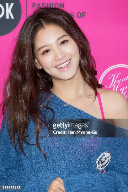 Kim Jae-Kyung of South Korean girl group Rainbow attends during at the 'Kwak Hyun-Joo' show on day five of the Seoul Fashion Week Spring/Summer 2014...