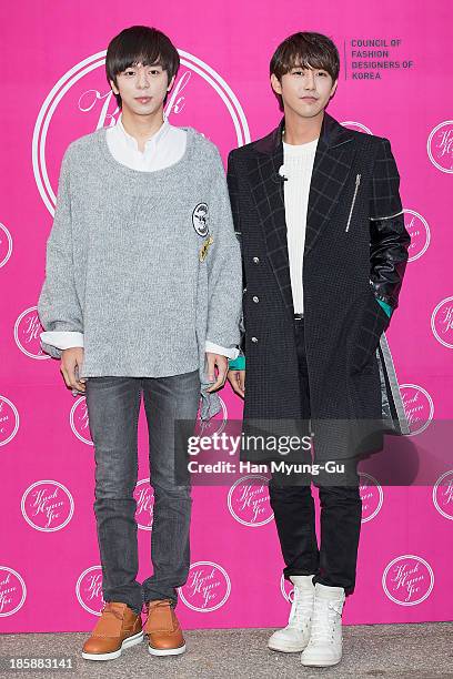 Moon Jun-Young and Hwang Kwang-Hee of South Korean boy band ZE:A attend during at the 'Kwak Hyun-Joo' show on day five of the Seoul Fashion Week...