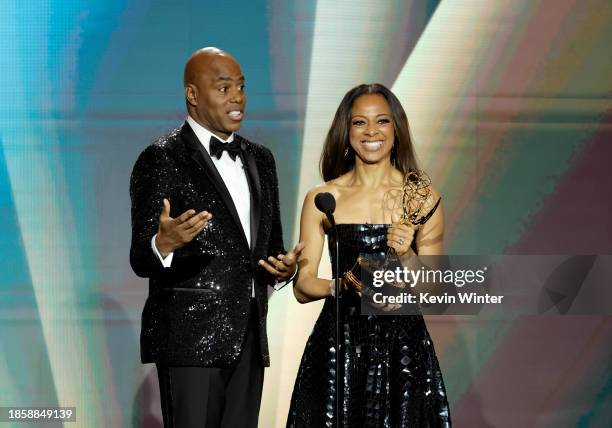 Kevin Frazier and Nischelle Turner accept the award for "Outstanding Entertainment News Series" onstage during the 50th Daytime Emmy Awards at The...