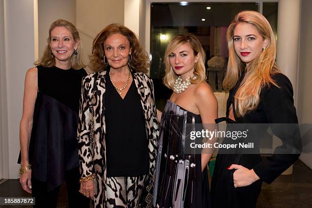 Cindy Rachofsky, Diane von Furstenberg, Nasiba Adilova and Sabine Ghanem pose for a photo during the Young Collectors Two x Two Cocktail party at the...