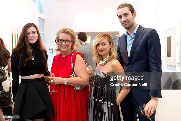 Guests enjoy the Young Collectors Two x Two Cocktail party at the Rachofsky House on October 25, 2013 in Dallas, Texas.