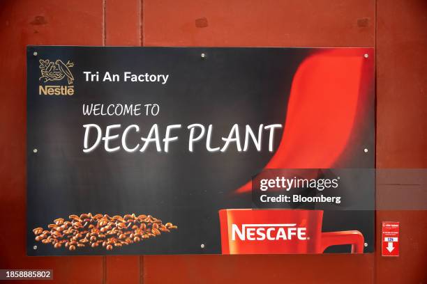 Signage for decaf plant at the Tri An factory of Nestle Vietnam Ltd., in Dong Nai, on Wednesday, November 29, 2023. Farmers have not been spared the...