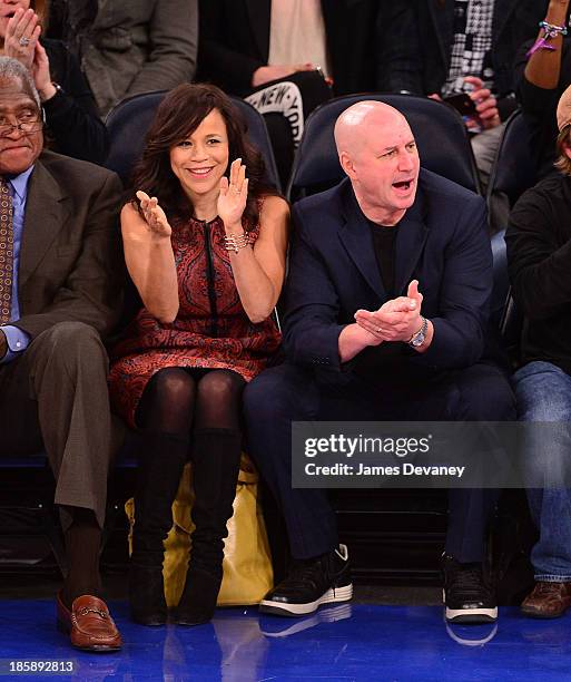 Rosie Perez and Eric Hayes attend the Charlotte Bobcats Vs. The New York Knicks at Madison Square Garden on October 25, 2013 in New York City.