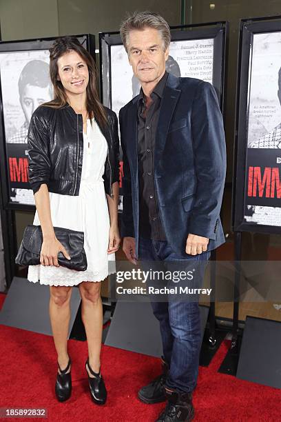 Actors Angela Gots and Harry Hamlin attend the "Immigrant" Film Premiere at Laemmle's Music Hall 3 on October 25, 2013 in Beverly Hills, California.