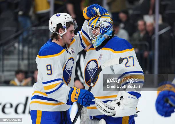 Zach Benson of the Buffalo Sabres congratulates Devon Levi after a 6-3 victory against the Vegas Golden Knights at T-Mobile Arena on December 15,...
