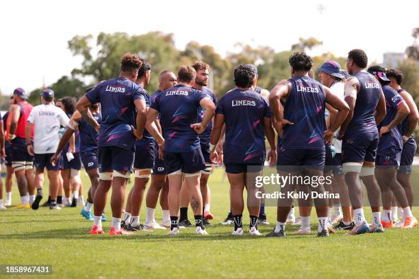 Rebels players huddle during a Melbourne Rebels Open Training Session at Gosch's Paddock on December 16, 2023 in Melbourne, Australia.