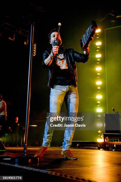 Matthew Ramsey of Old Dominion performs on stage at Bridgestone Arena on December 15, 2023 in Nashville, Tennessee.