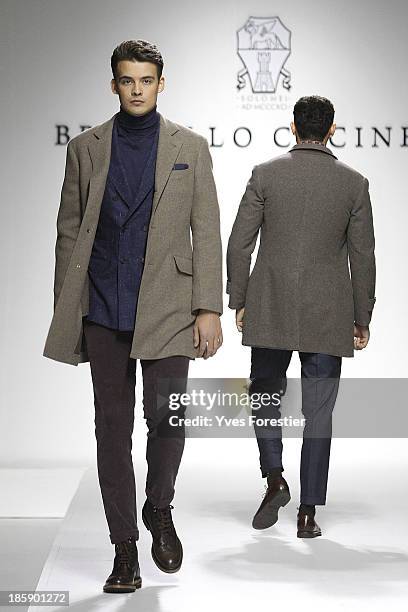 Models walk the runway during the Brunello Cucinelli fashion show at Hotel International Tashkent on October 25, 2013 in Tashkent, Uzbekistan.