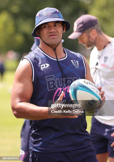 Jordan Uelese of the Rebels looks on during a Melbourne Rebels Open Training Session at Gosch's Paddock on December 16, 2023 in Melbourne, Australia.
