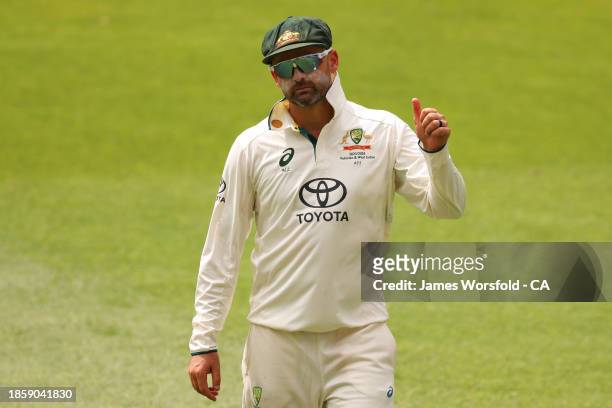 Nathan Lyon of Australia gives a thumbs up to the crowd during day three of the Men's First Test match between Australia and Pakistan at Optus...