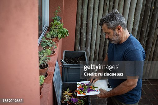 Compost Man Man Composting Organic Remains In Home Composter High-Res Stock Photo ...