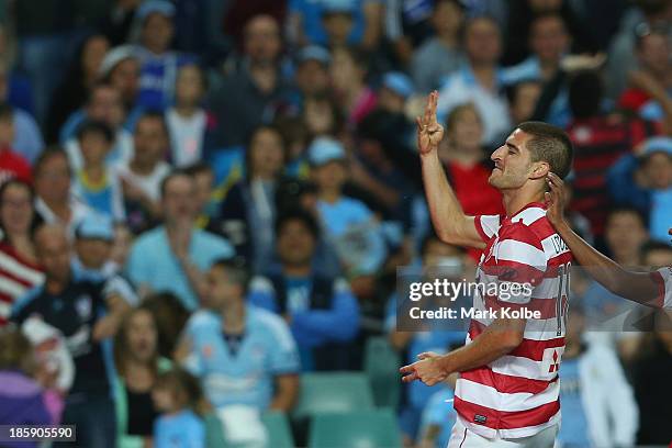 Iacopo La Rocca ofthe Wanderers gestures to the Sydney FC supporters as he celebrates scoring a goal during the round three A-League match between...