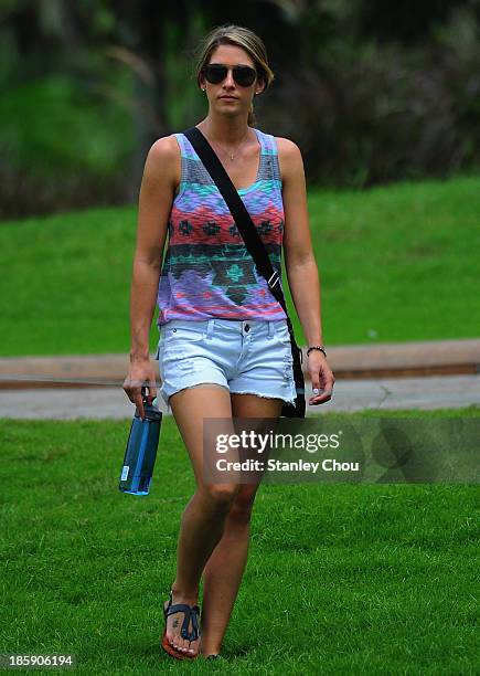 Jillian Stacey, girlfriend of Keegan Bradley of USA walks to the 9th hole during round three of the CIMB Classic at Kuala Lumpur Golf & Country Club...