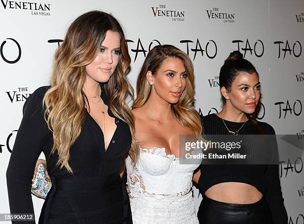 Television personalities Khloe Kardashian, Kim Kardashian and Kourtney Kardashian arrive at the Tao Nightclub at The Venetian Las Vegas to celebrate...