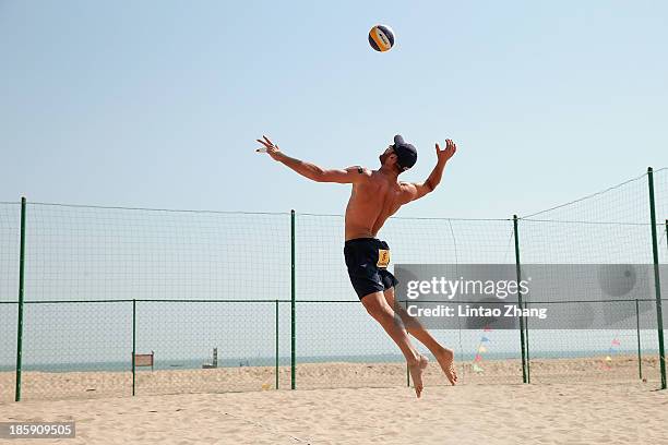 Alison Cerutti of Brazil warming up before during the 2013 FIVB World Tour Xiamen Grand Slam Men's final march on October 26, 2013 in Xiamen, China.