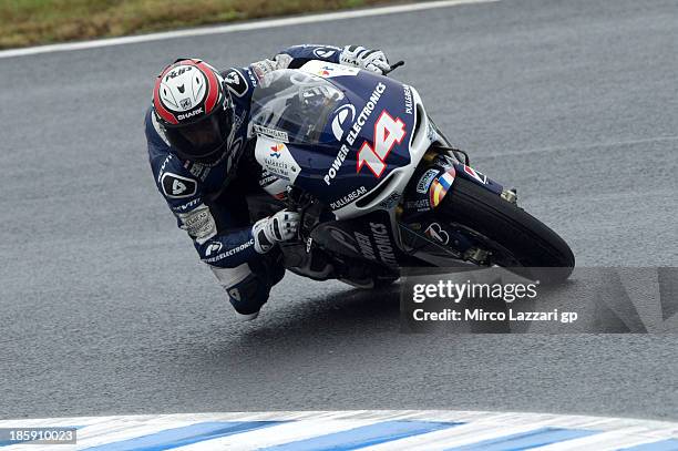 Randy De Puniet of France and Suzuki Test Team rounds the bend during the MotoGP of Japan qualifying session at Twin Ring Motegi on October 26, 2013...