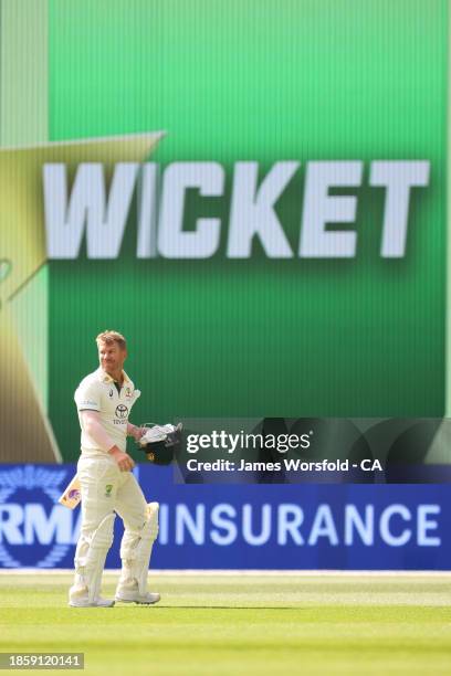 David Warner of Australia2 walks off the field after getting caught out during day three of the Men's First Test match between Australia and Pakistan...