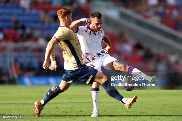 Aleksandar Susnjar of the Glory competes with Phillip Cancar of the Jets during the A-League Men round 8 match between Newcastle Jets and Perth Glory...