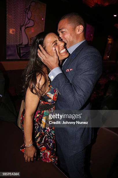 Journalist TJ Holmes and wife Marilee Fiebig-Holmes attend the 2013 Black Girls Rock! Shot Caller Dinner at B & Co on October 25, 2013 in New York...