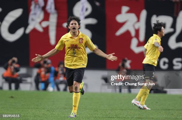 Elkeson De Oliveira Cardoso of Guangzhou Evergrande celebrates after scoring their first goal during the AFC Champions League Final 1st leg match...