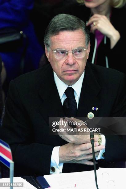 Costa Rican President Miguel Angel Rodriguez attends the opening of the Rio Group's 15th Presidential Summit, 17 August 2001 in Santiago. The Rio...