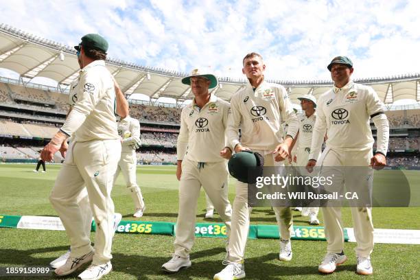 Australia leave the field at the tea break during day three of the Men's First Test match between Australia and Pakistan at Optus Stadium on December...