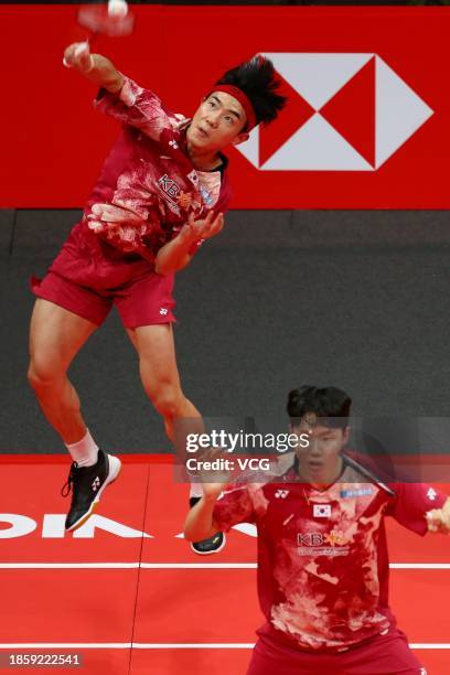 Kang Min Hyuk and Seo Seung Jae of South Korea compete in the Men's Doubles Semi-final match against Liu Yuchen and Ou Xuanyi of China on day four of...