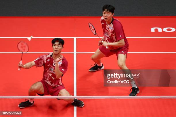 Kang Min Hyuk and Seo Seung Jae of South Korea compete in the Men's Doubles Semi-final match against Liu Yuchen and Ou Xuanyi of China on day four of...