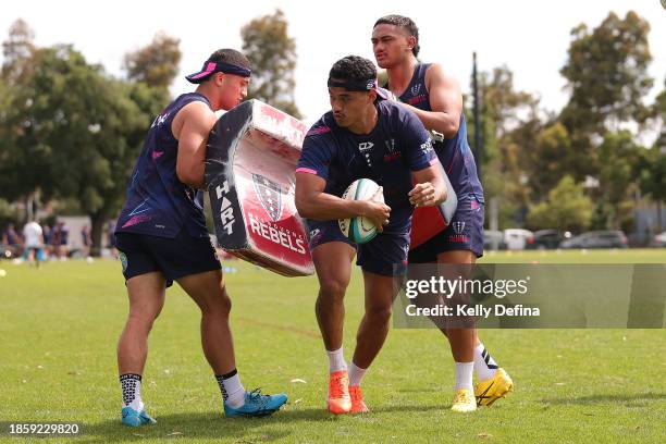 Rebels men's squad members in action during a Melbourne Rebels Open Training Session at Gosch's Paddock on December 16, 2023 in Melbourne, Australia.