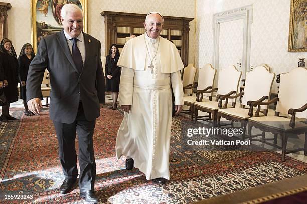 Pope Francis meets with President Ricardo Alberto Martinelli Berrocal of Panama in a private audience at his studio on October 26, 2013 in Vatican...