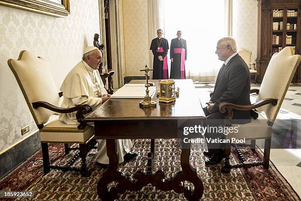 Pope Francis meets with President Ricardo Alberto Martinelli Berrocal of Panama in a private audience at his studio on October 26, 2013 in Vatican...