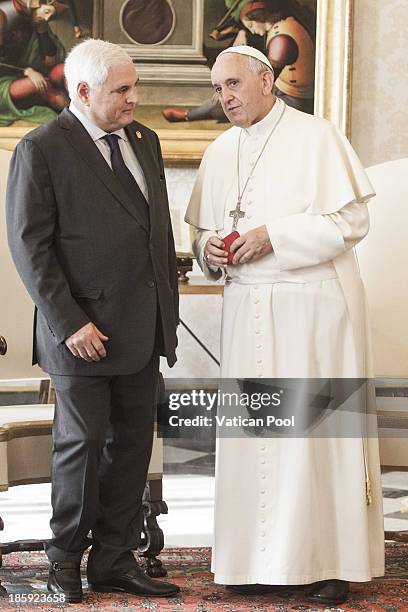 Pope Francis meets with President Ricardo Alberto Martinelli Berrocal of Panama in a private audience at his studio on October 26, 2013 in Vatican...