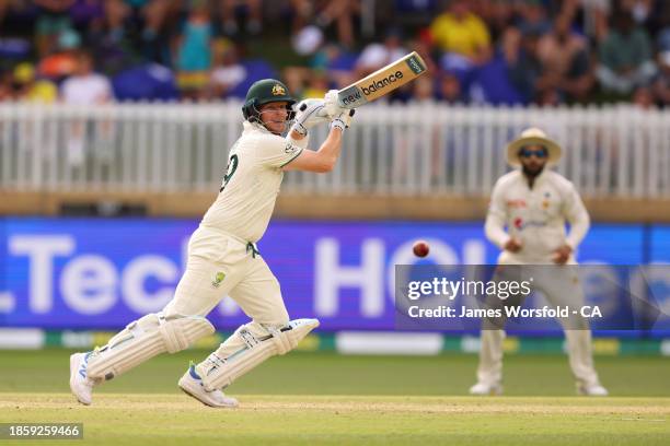 Steve Smith of Australia watches the ball after playing a cut shot during day three of the Men's First Test match between Australia and Pakistan at...