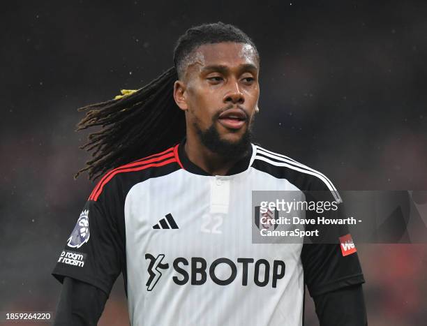 Fulham's Alex Iwobi during the Premier League match between Liverpool FC and Fulham FC at Anfield on December 3, 2023 in Liverpool, England.