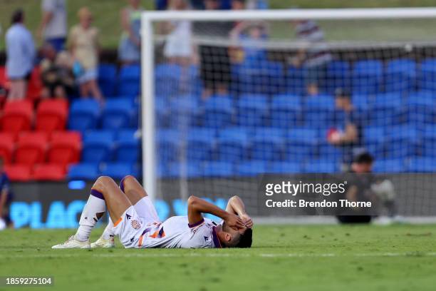 Glory players react at full-time during the A-League Men round 8 match between Newcastle Jets and Perth Glory at McDonald Jones Stadium, on December...