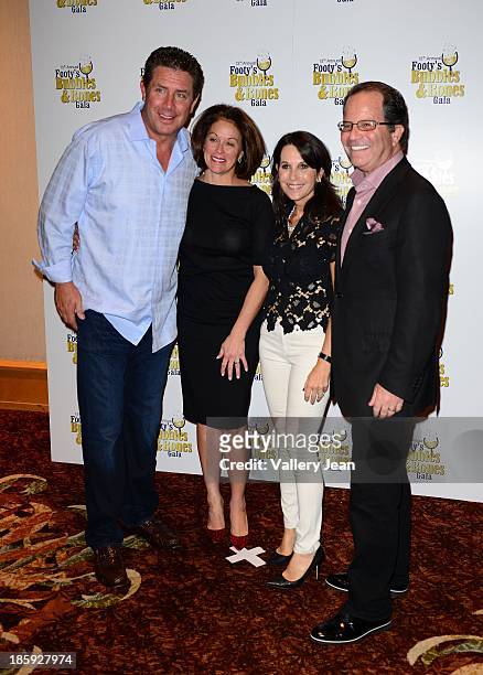 Dan Marino, Claire Marino, robin Levinson and Mark Levinson attend the 13th Annual Footy's Bubbles & Bones Gala at Westin Diplomat on October 25,...