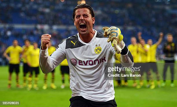 Goalkeeper Roman Weidenfeller of Dortmund celebrates after winning the Bundesliga match between FC Schalke 04 and Borussia Dortmund at Veltins-Arena...