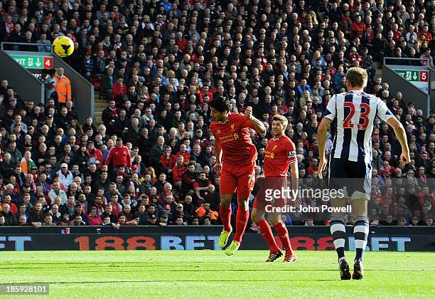 Luis Suarez of Liverpool scores the second goal during the Barclays Premier League match between Liverpool and West Bromwich Albion at Anfield on...