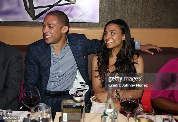 Journalist TJ Holmes and wife Marilee Fiebig-Holmes attend the 2013 Black Girls Rock! Shot Caller Dinner at B & Co on October 25, 2013 in New York...