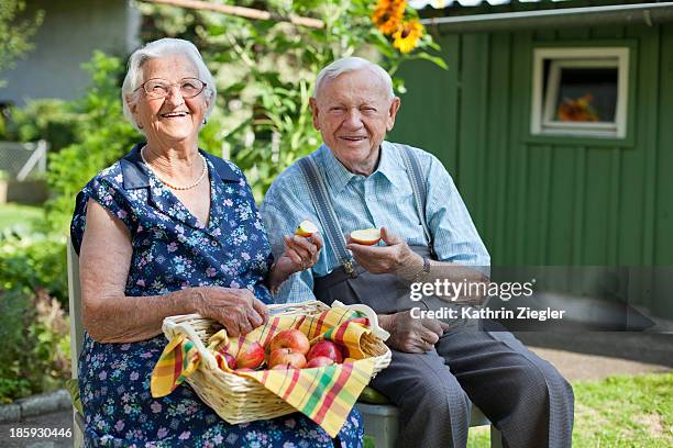 happy senior couple in their garden - 80 89 years stock pictures, royalty-free photos & images