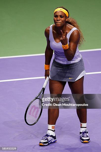Serena Williams of the United States reacts after a missed match point against Jelena Jankovic of Serbia in their semi final match during day five of...