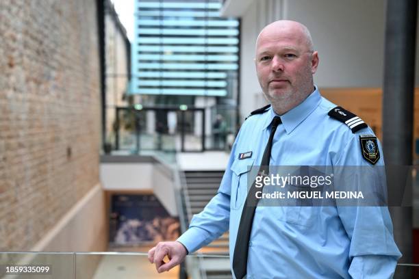 Captain Etienne Lestrelin, in charge of the fight against bank card fraud at Comcyber-MI poses at the Gendarmerie Nationale headquarters in...