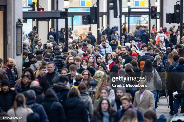 Crowds of shoppers on Oxford Street in London, UK, on Monday, Dec. 18, 2023. The Office for National Statistics are due to release the latest UK...