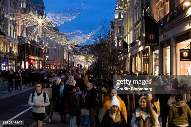 Christmas lights along Regent Street in London, UK, on Monday, Dec. 18, 2023. The Office for National Statistics are due to release the latest UK...