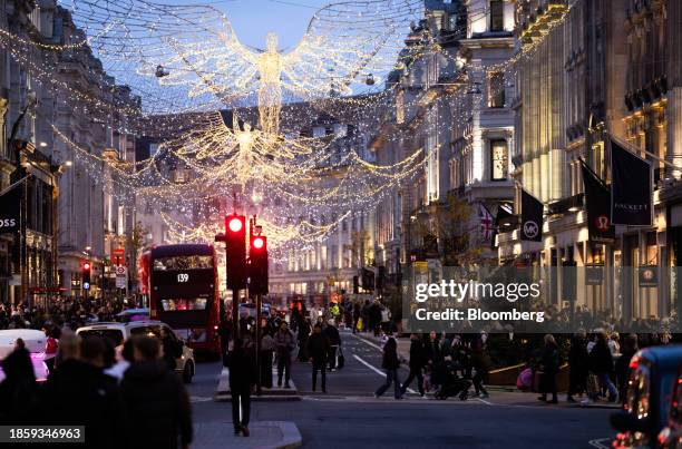 Christmas lights along Regent Street in London, UK, on Monday, Dec. 18, 2023. The Office for National Statistics are due to release the latest UK...