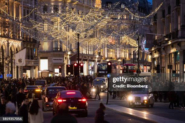 Christmas lights along Regent Street in London, UK, on Monday, Dec. 18, 2023. The Office for National Statistics are due to release the latest UK...