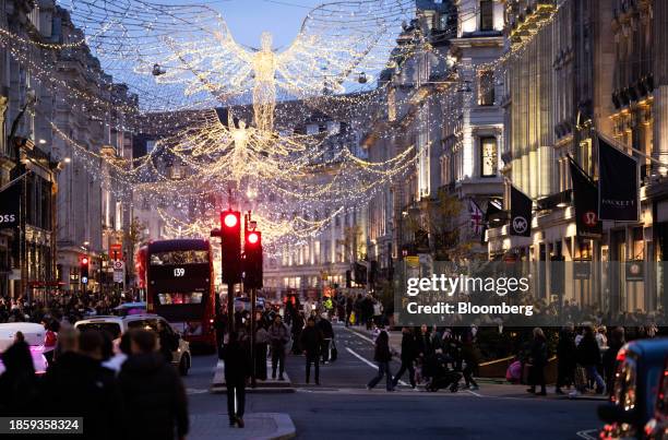 Christmas lights along Regent Street in London, UK, on Monday, Dec. 18, 2023. The Office for National Statistics are due to release the latest UK...