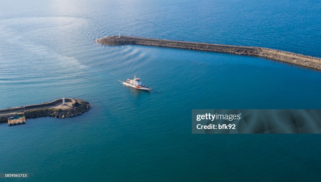 Aerial view of Turkish coast guard approaching port.