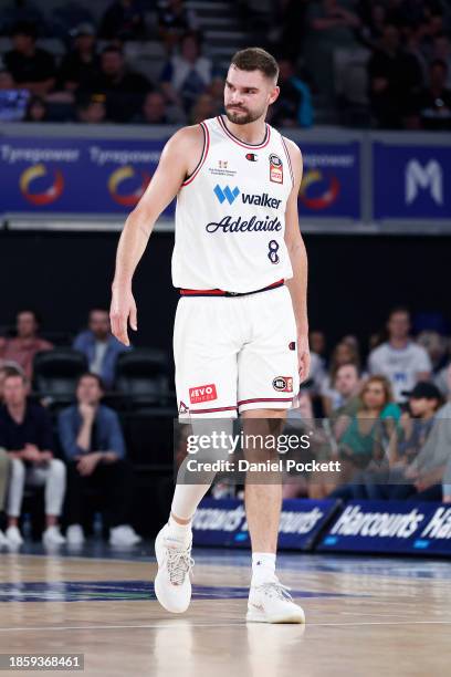 Isaac Humphries of the 36ers leaves the court after hurting himself in a contest during the round 11 NBL match between Melbourne United and Adelaide...