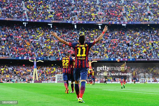 Neymar of FC Barcelona celebrates after scoring the opening goal during the La Liga match between FC Barcelona and Real Madrid CF at Camp Nou on...